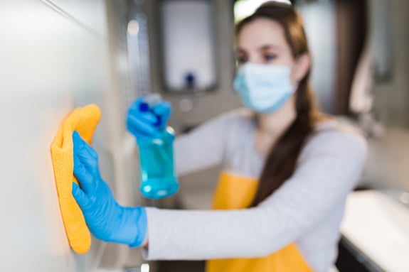 cleaner with mask on