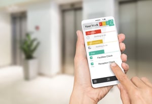 Mobile-phone-hands-Checkit-APP-INDUSTRY-HOTEL-OFFICE-1
