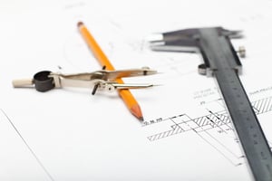 UKAS Calibration Tools and papers with sketches on the table