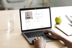 mockup-featuring-a-man-working-on-his-macbook-pro-at-home-m16384-r-el2
