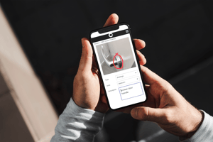 mockup-of-a-man-holding-an-iphone-11-pro-with-both-hands-2127-el1