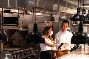 kitchen staff demonstrating food service innovation 